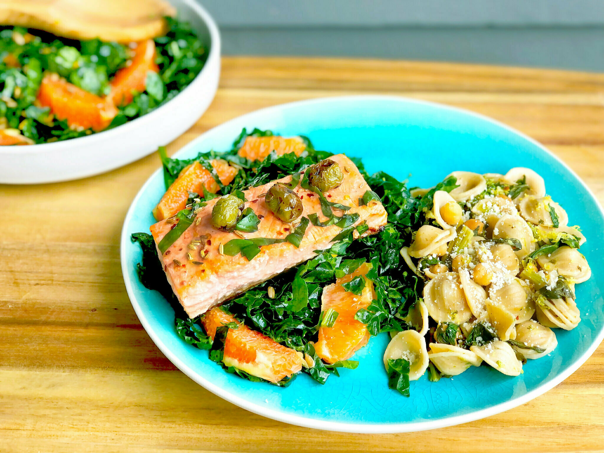 Mediterranean Salmon with Olives, served with Orecchiette with Chickpeas and Greens and Citrus Kale Salad Image