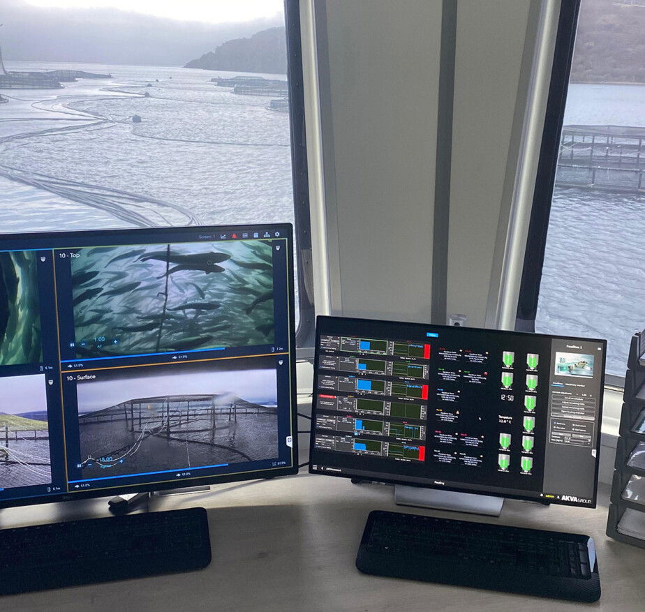 Computer monitors on board a ship  at the salmon farm showing underwater salmon imagery